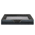 An oversized dog bed, removable  pads and washable
